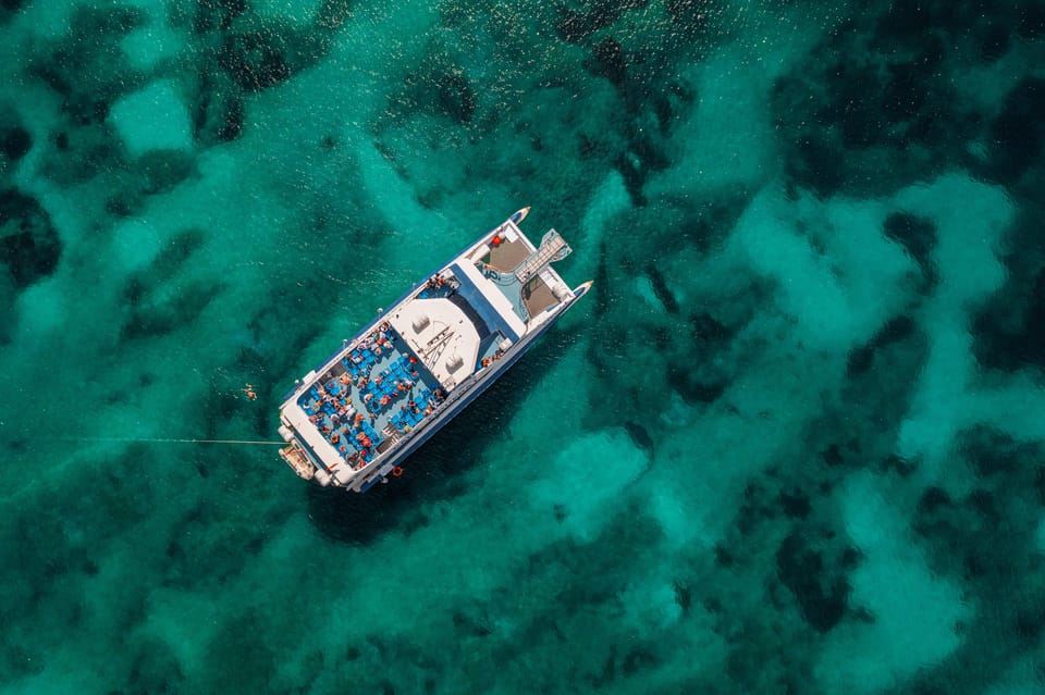 Alcudia: Boat Trip to Coll Baix - The Cruise Out: Coastal Views, Alcanada, and Lighthouse Vibes