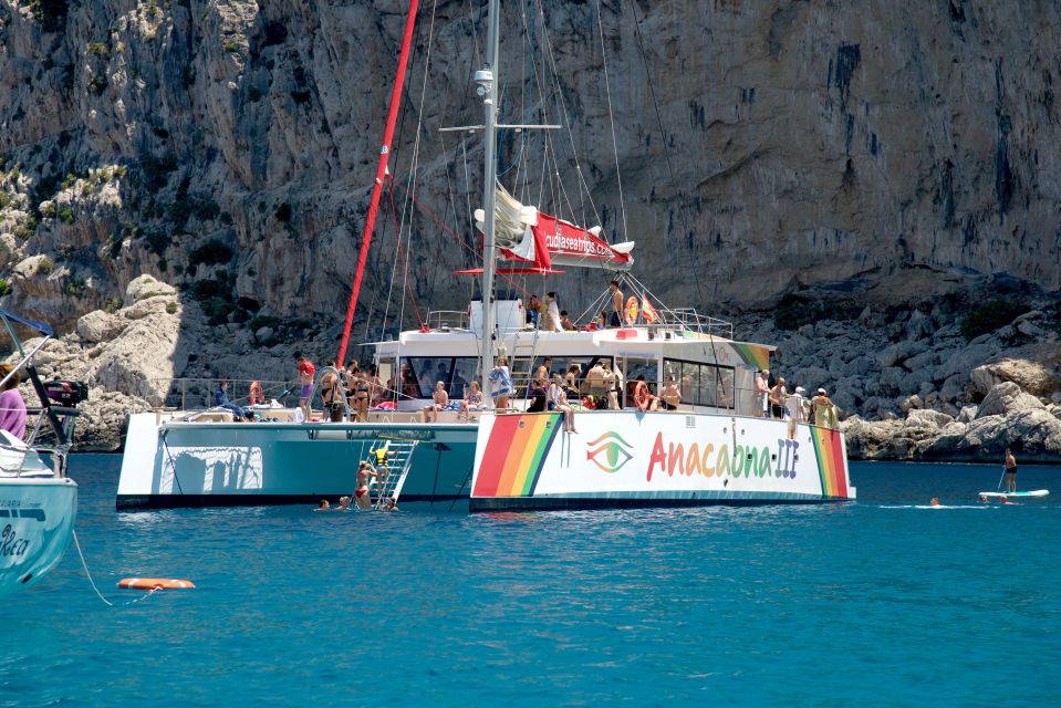Alcudia: Sunset Catamaran Tour with Dinner and Snorkeling - Snorkeling Stops: Secluded Spots and Cool Water Time