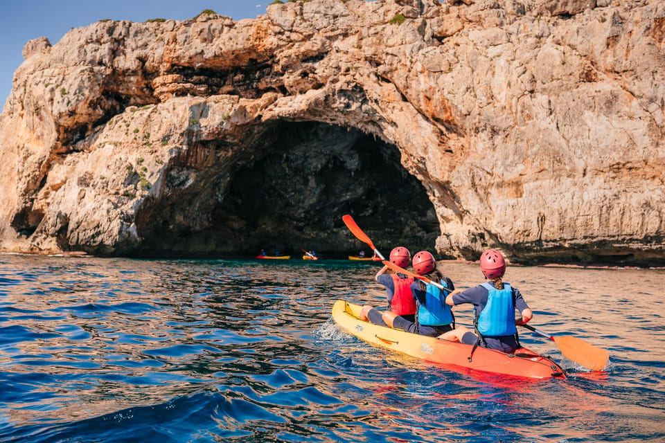 Cala Varques: Guided Sea Caves Kayak & Snorkeling Expedition - Cave exploring gear: why helmet and flashlight actually matter