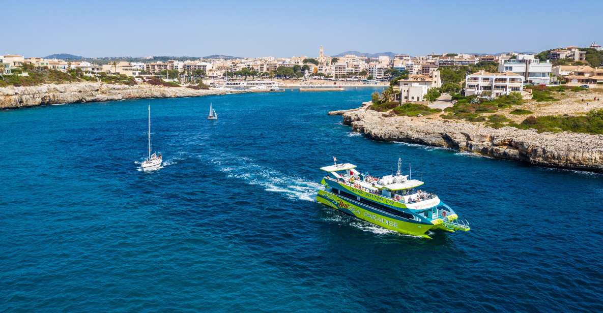 From Porto Cristo: East Coast Glass-Bottom Boat Trip - The big payoff: cave passes, coves, and that glass-bottom view