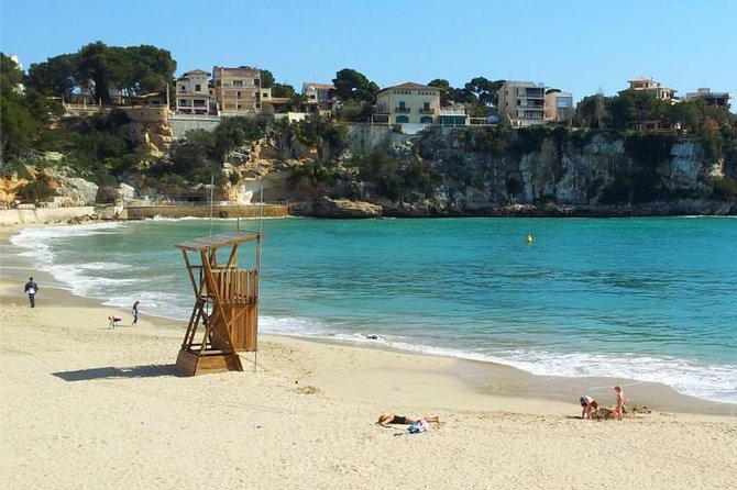 Full-Day Mallorca Caves Tour: Drach, Hams & Pearl Factory Visit - Cuevas del Drach: Lake Martel, classical music, and that 21°C cave air