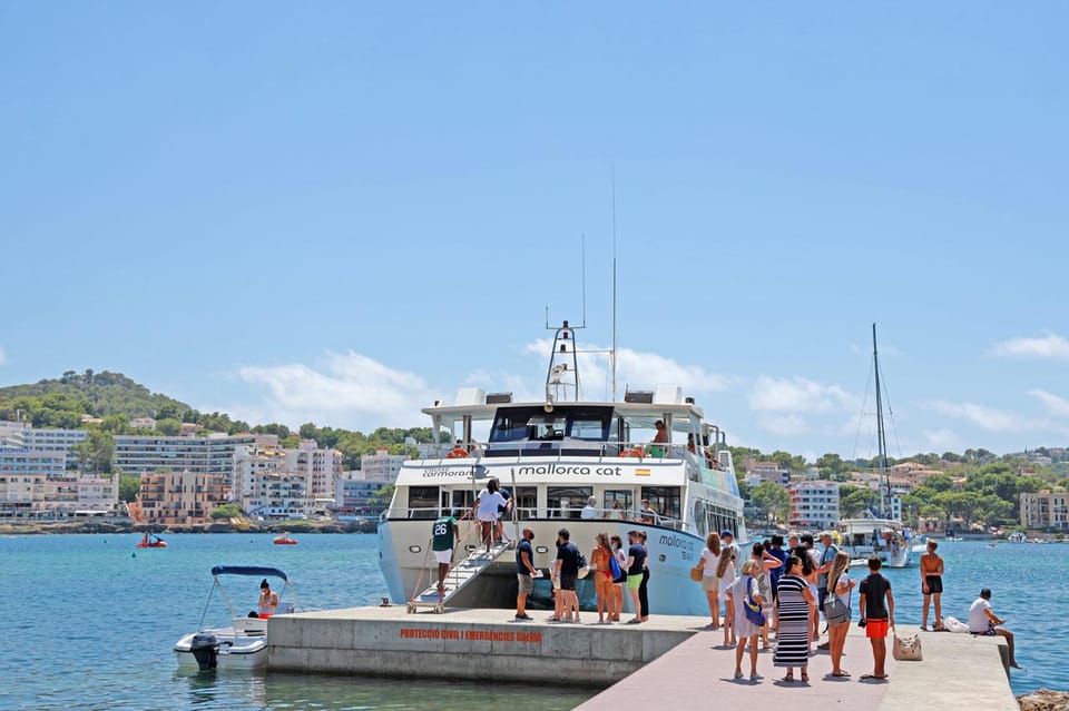 Mallorca: 2-Hour Coastline & Malgrat Islands Catamaran Tour - Onboard setup: sun decks, toilets, and the bar vibe