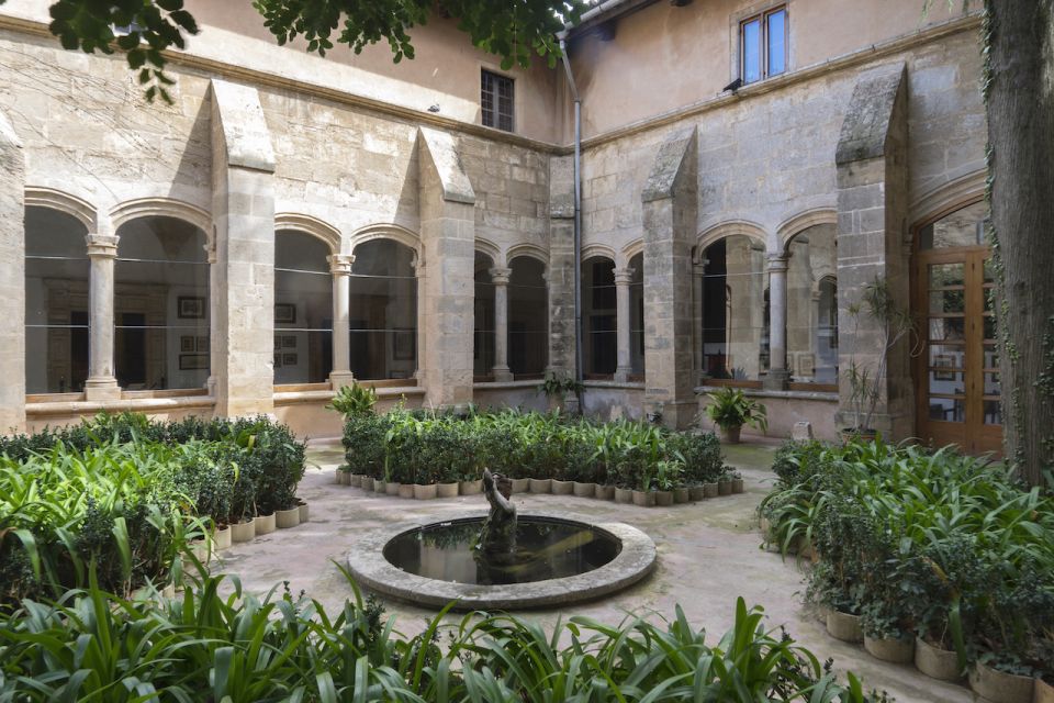 Mallorca: Carthusian Monastery Valldemossa Entrance Ticket - The white-arch corridor and 400 years of monk solitude
