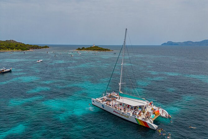 Mallorca Catamaran Cruise with Scenic Views and BBQ Lunch - Stop 2 at Coll Baix: a small cove that feels like you found it by accident