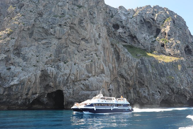 Mallorca in One Day Sightseeing Tour with Boat Ride and Vintage Train - Barcos Azules boat ride: cliffs and caves from sea level