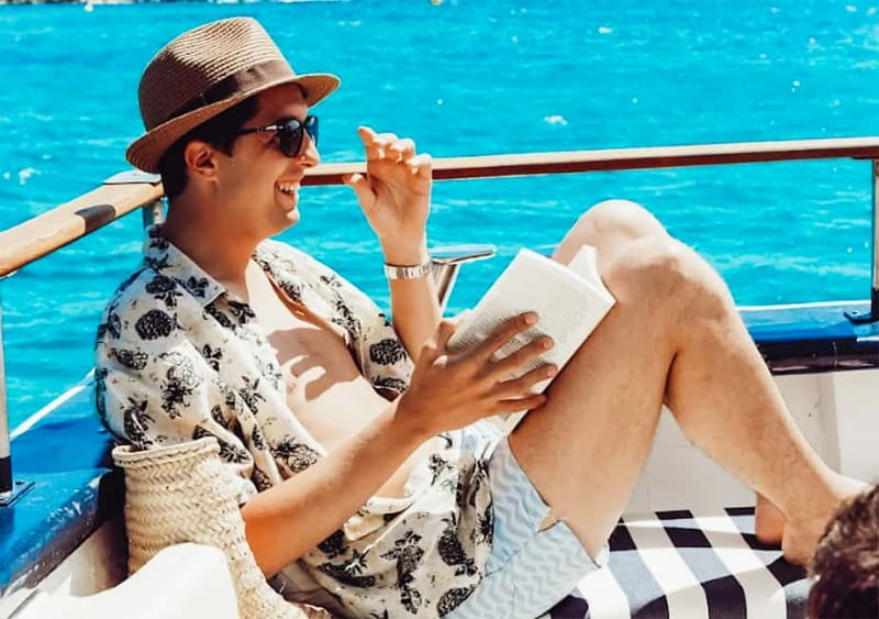 Mallorca: Palma Boat Tour & Snorkeling with Drink Included - Onboard vibe: music requests, bar drink, and crew control