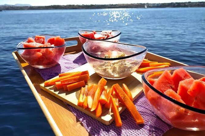 Mallorca Sailing Adventure with Snorkeling, Snacks & Drinks - Snorkeling and Paddleboard Surf: packing light is the real win