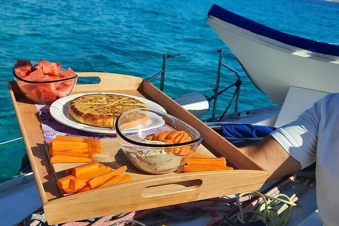 Mallorca Sailing Adventure with Snorkeling, Snacks & Drinks - Badia de Palma: where the first swim stop usually shines