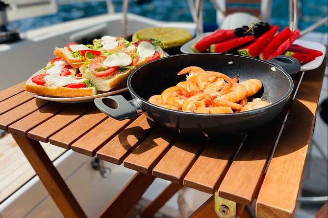 Mallorca sailing tour with tapas and wine - Captain and Group Energy: Small Boat, Mixed Reviews, Your Best Strategy