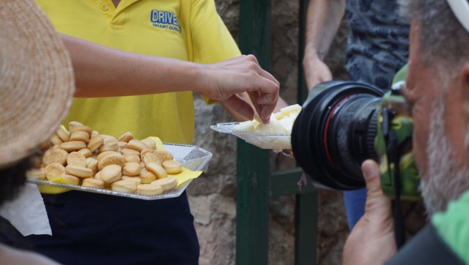 Mallorca: Tramuntana Mountains Tour with Local Guide & Lunch - Lunch in Sóller: bread with tomatoes, olive oil, jam, cheese, olives, almond cake