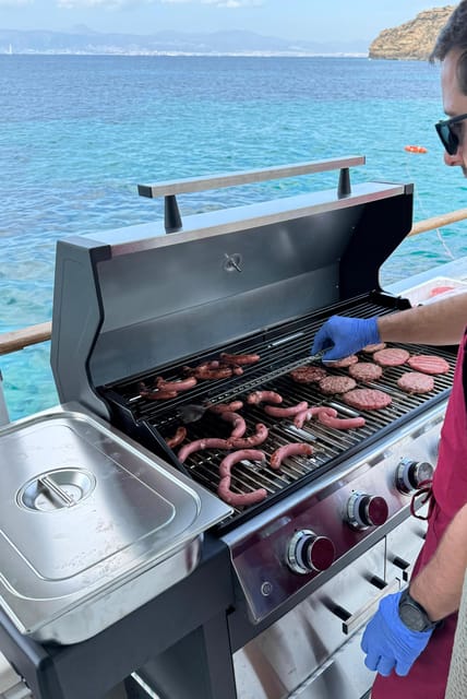 Palma Bay: Boat Tour with BBQ, Snorkelling, & Sunset Option - Your swimming and snorkeling stop in crystal water