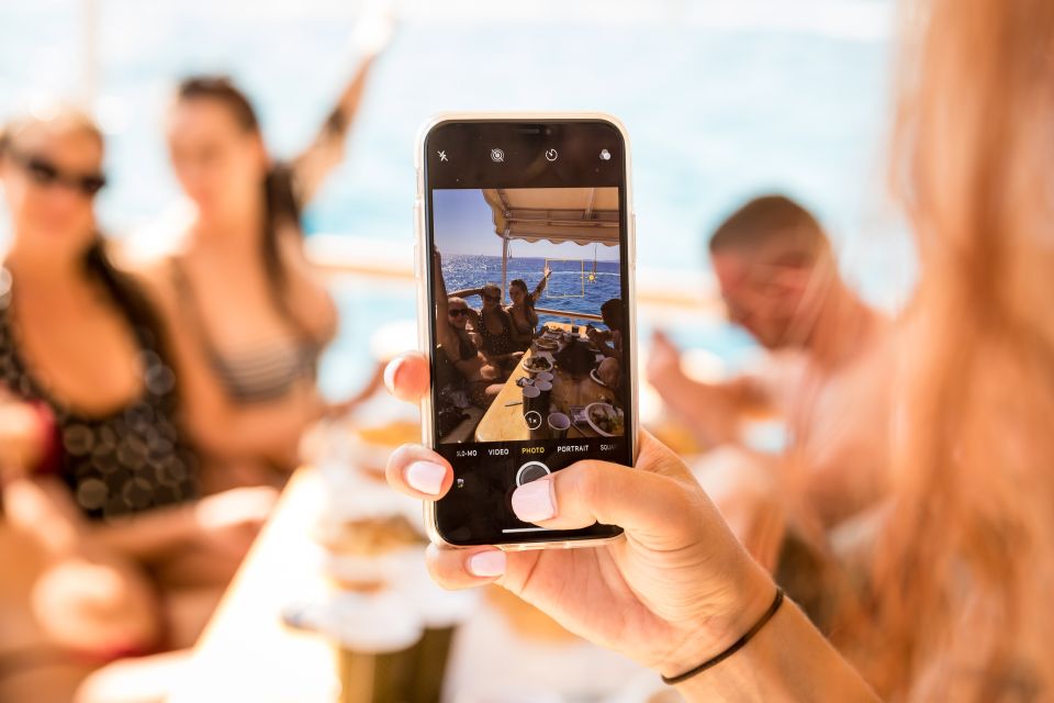 Palma de Mallorca: Palma Bay Boat Tour with Snorkeling - Music, DJ energy, and sports on satellite TV: how the vibe really feels