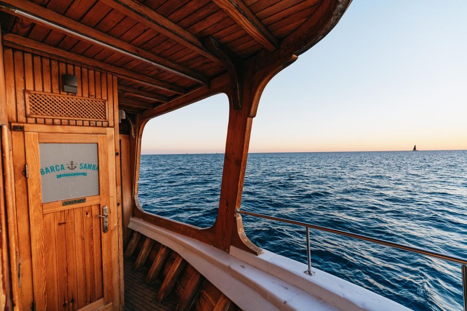 Palma de Mallorca: Sunset Boat Tour - The boat experience: chill top deck vs party downstairs