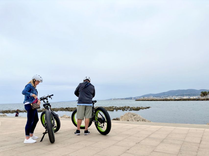 Palma: Guided City Tour with a Fat Tire E-Bike - El Molinar Finish: Colorful Houses, Quieter Shoreline, and Mountain Views