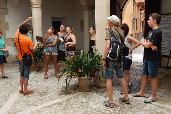 Private walking tour in Palma de Mallorca with local guides. - Plaça Major and the modernist details you might miss solo
