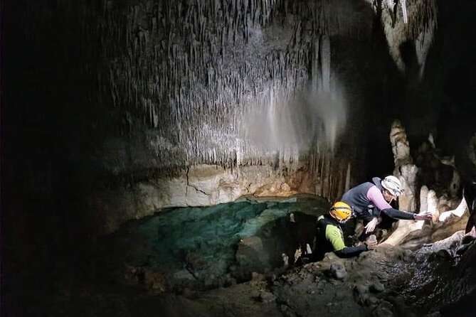 Small-Group Cova de Coloms Sea Caving Tour in Mallorca - The swim-in entrance: currents, optional cliff jump, and confidence